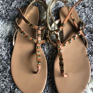 Woman’s BCBG studded sandals